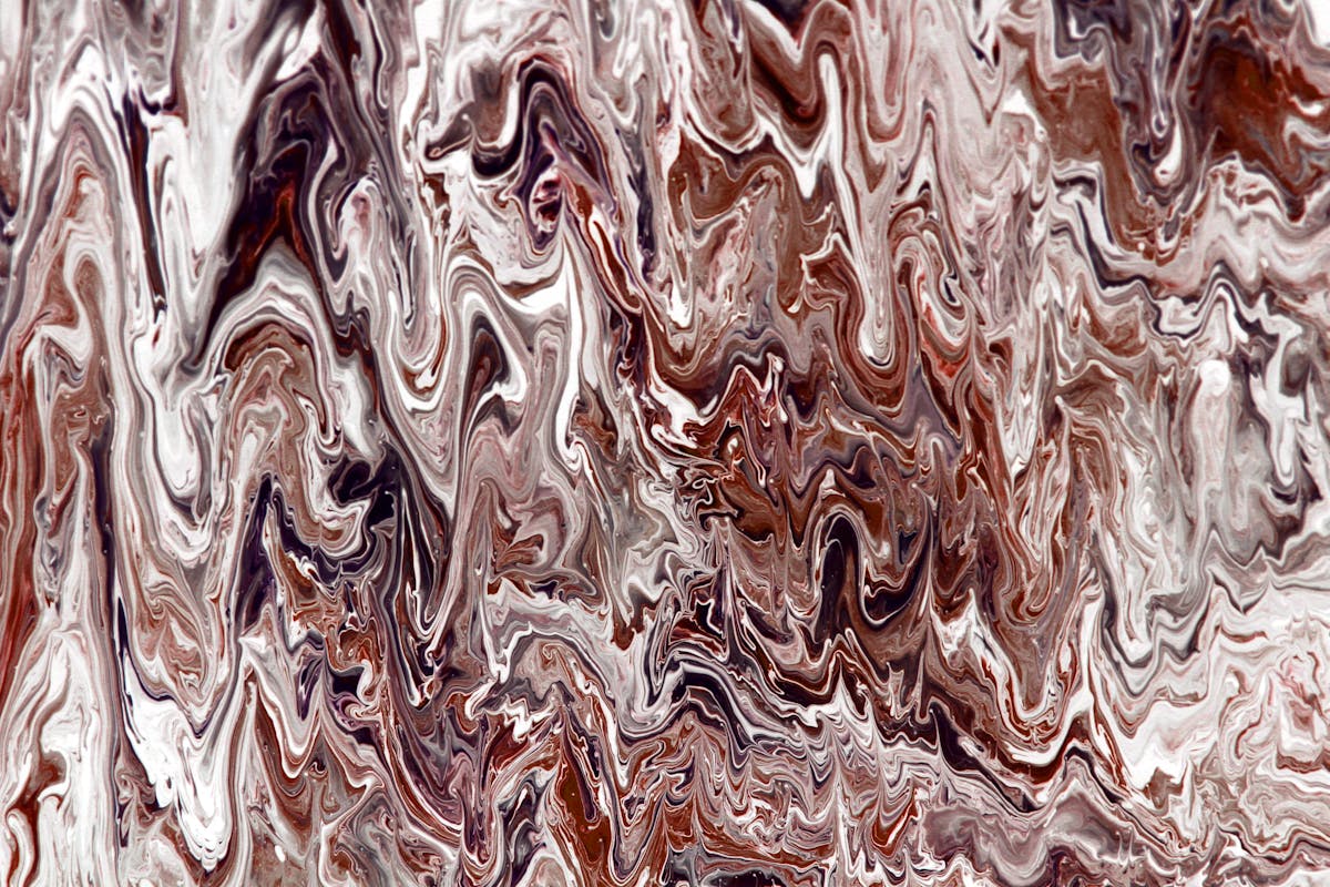 Swirling metallic epoxy finish pattern comparing flake metallic and solid color options